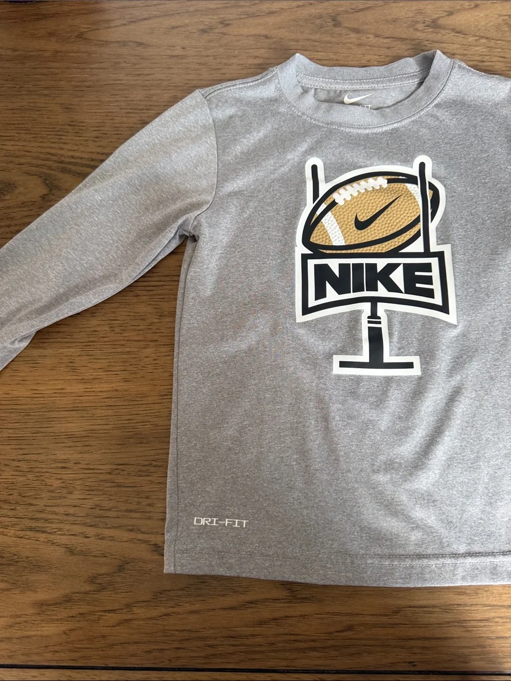Kids Nike Gray Long Sleeve Tee Dri fit with Football Goalpost Graphic